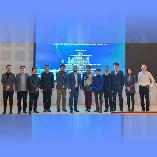 HOENSOEY team and industry representatives at a technical cooperation event.