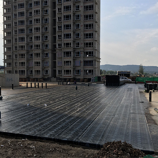 Efficient Parking Deck Drainage with Unique Water Storage Crates