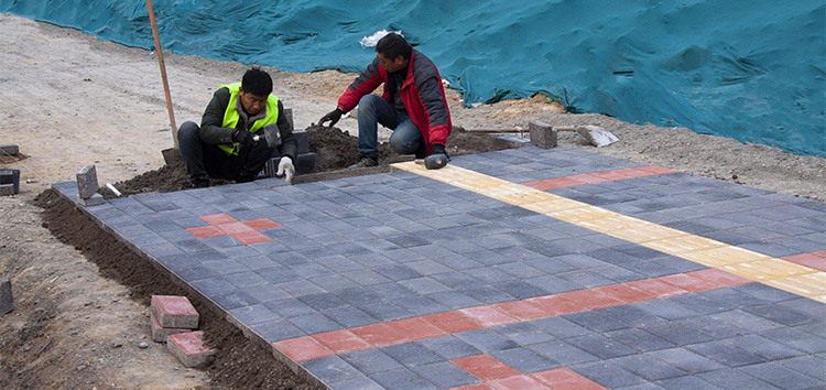 Laying Ceramic Permeable Pavers for Improved Groundwater Recharge